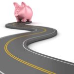 Piggy bank at the end of a winding road.