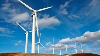 ASX renewable energy shares represented by wind turbines on a hillside