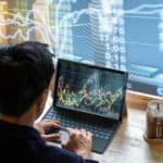 A stoke broker watches the share price movements on the Asian share market