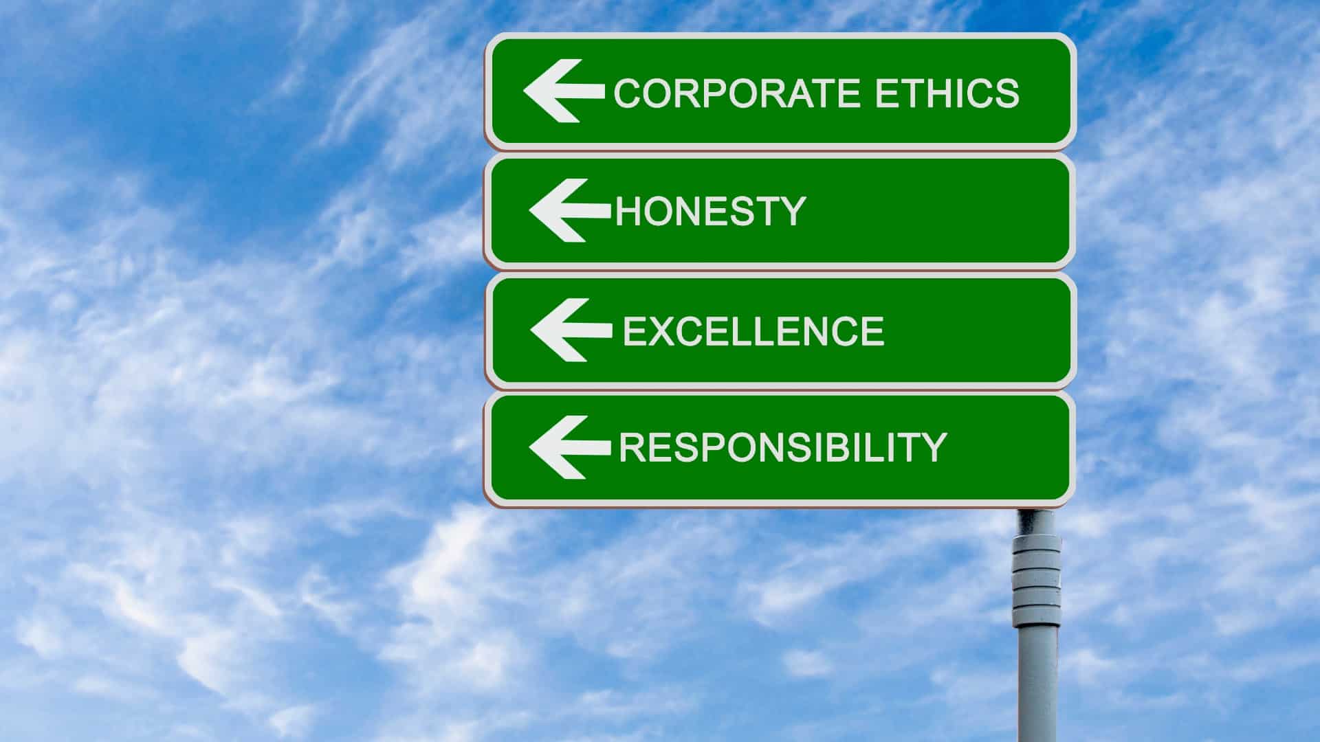 ethical investing in ASX shares represented by road signs stating corporate ethics and honesty