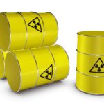 ASX uranium shares represented by yellow barrels of uranium