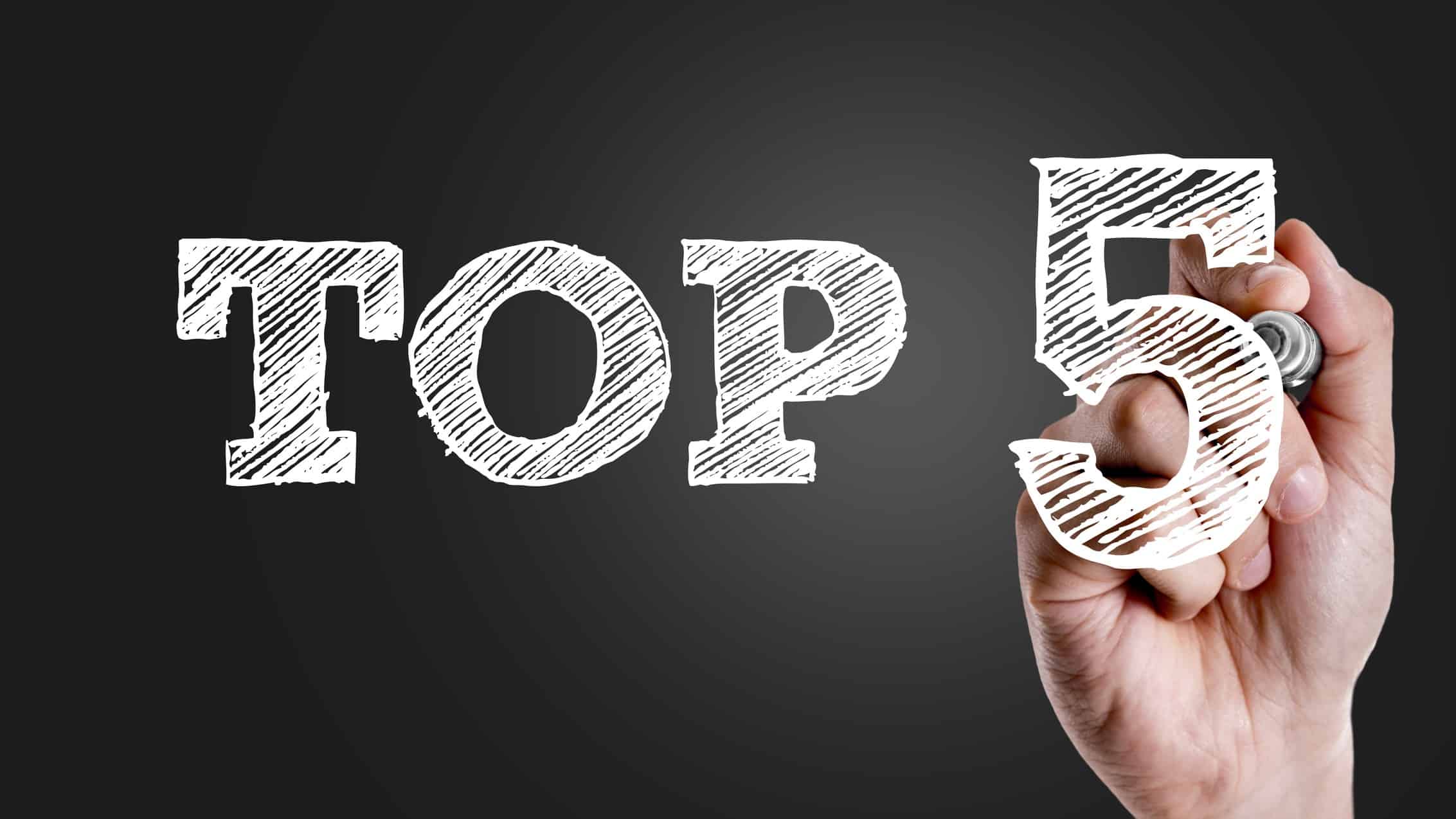 Hand writing Top 5 in white pen