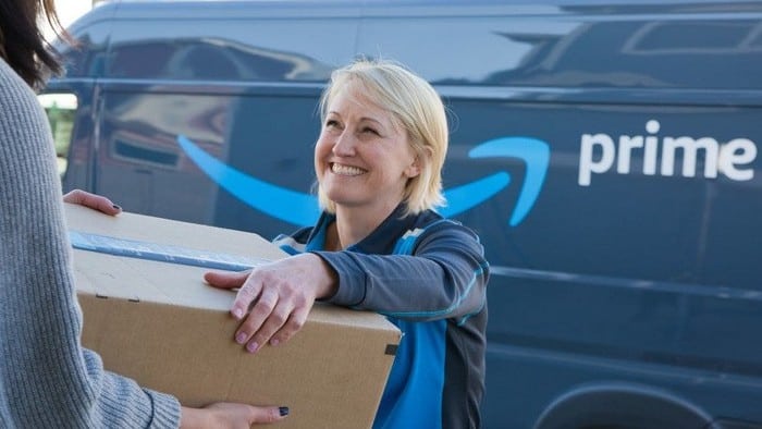 woman delivering Amazon Prime parcel