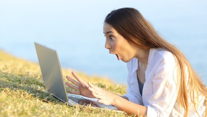 surprised girl with laptop