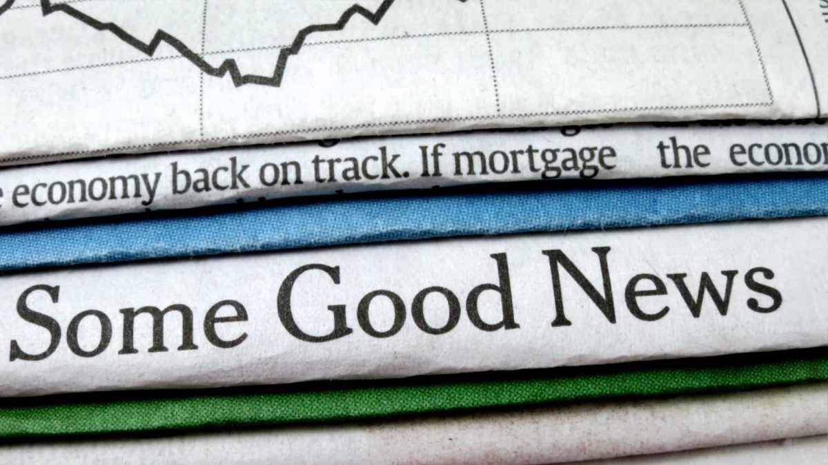A newspaper with the words "Some good news', indicating economic and share price recovery