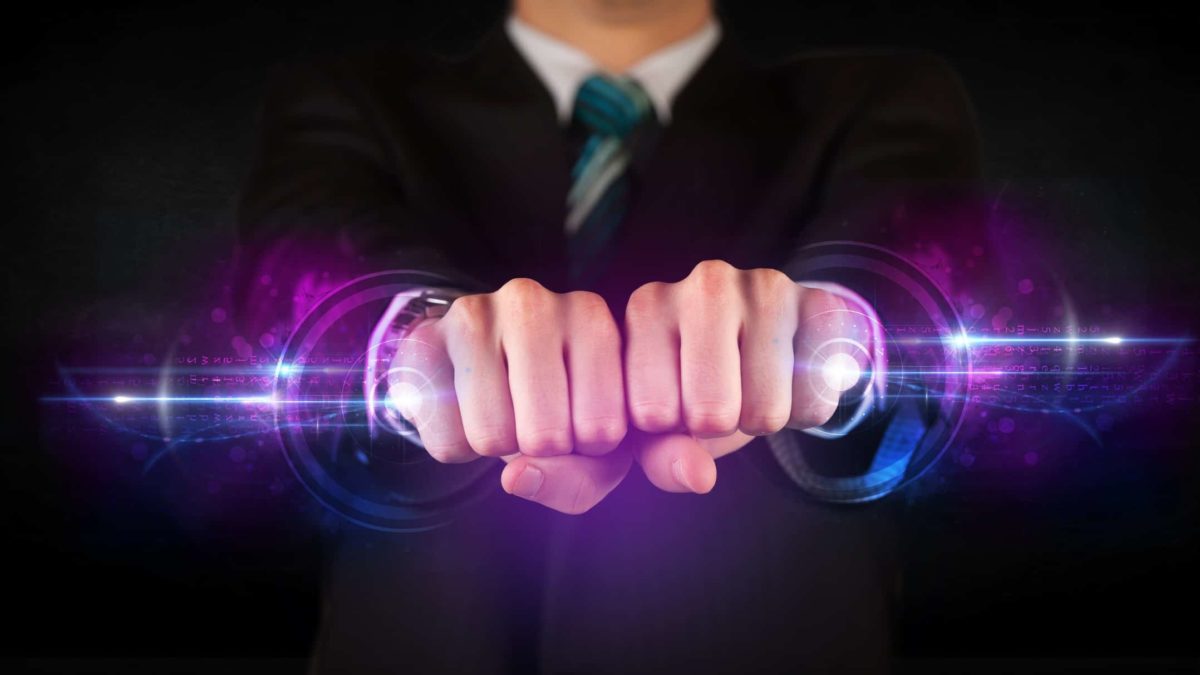 A businessman holds a bolt of energy in both hands, indicating a share price rise in ASX energy companies