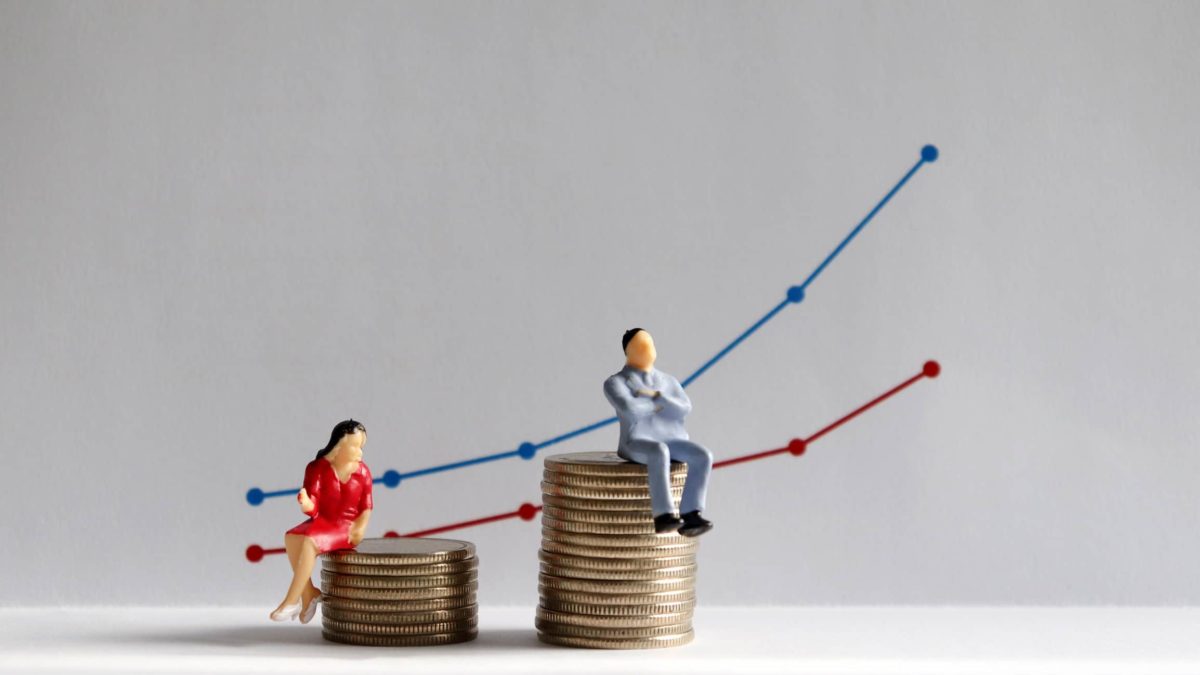 graph and image of man nd woman sitting on coins which illustrates gender gap