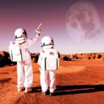 Two astronauts stand on the moon.