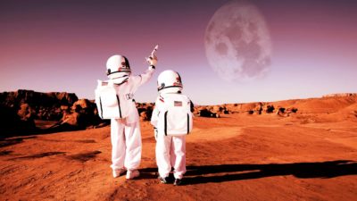 Two astronauts stand on the moon, indicating a rocketing share price