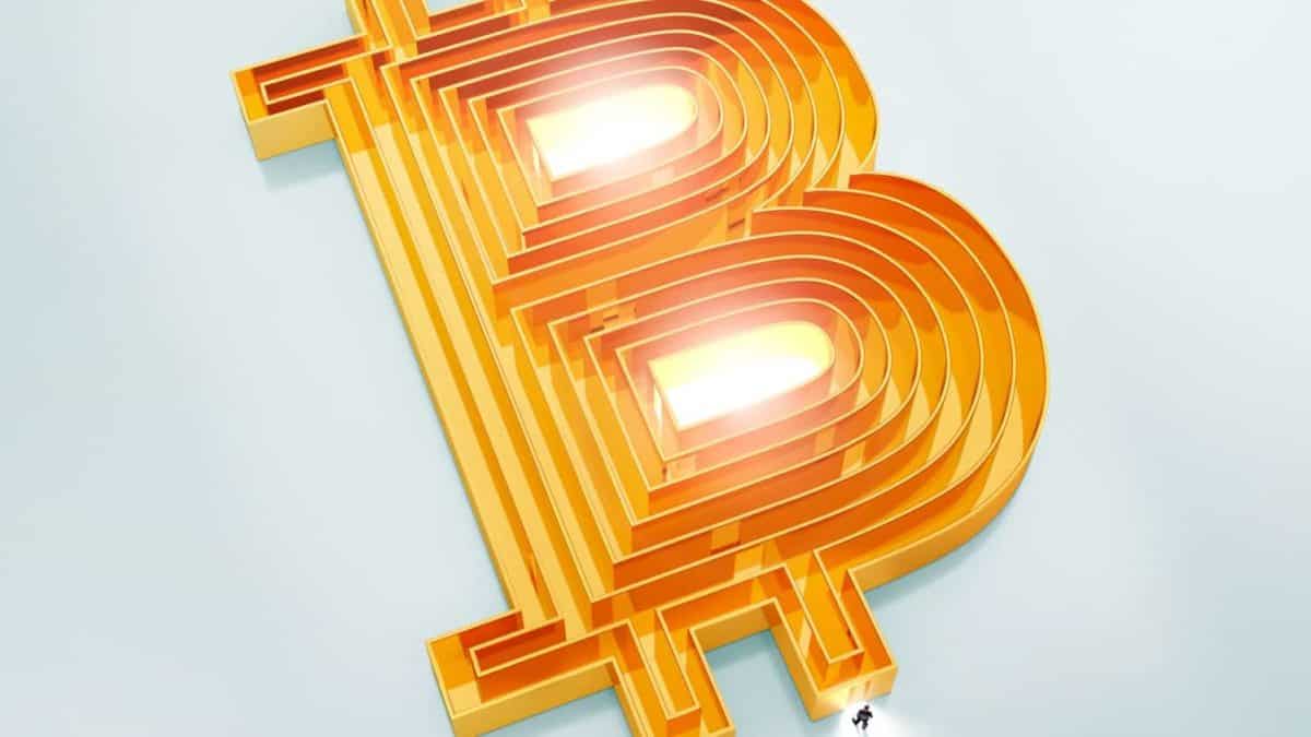 orange yellow bitcoin logo with a man at the end