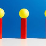 Three brightly coloured objects against a backdrop of blue, indication three winning ASX share prices