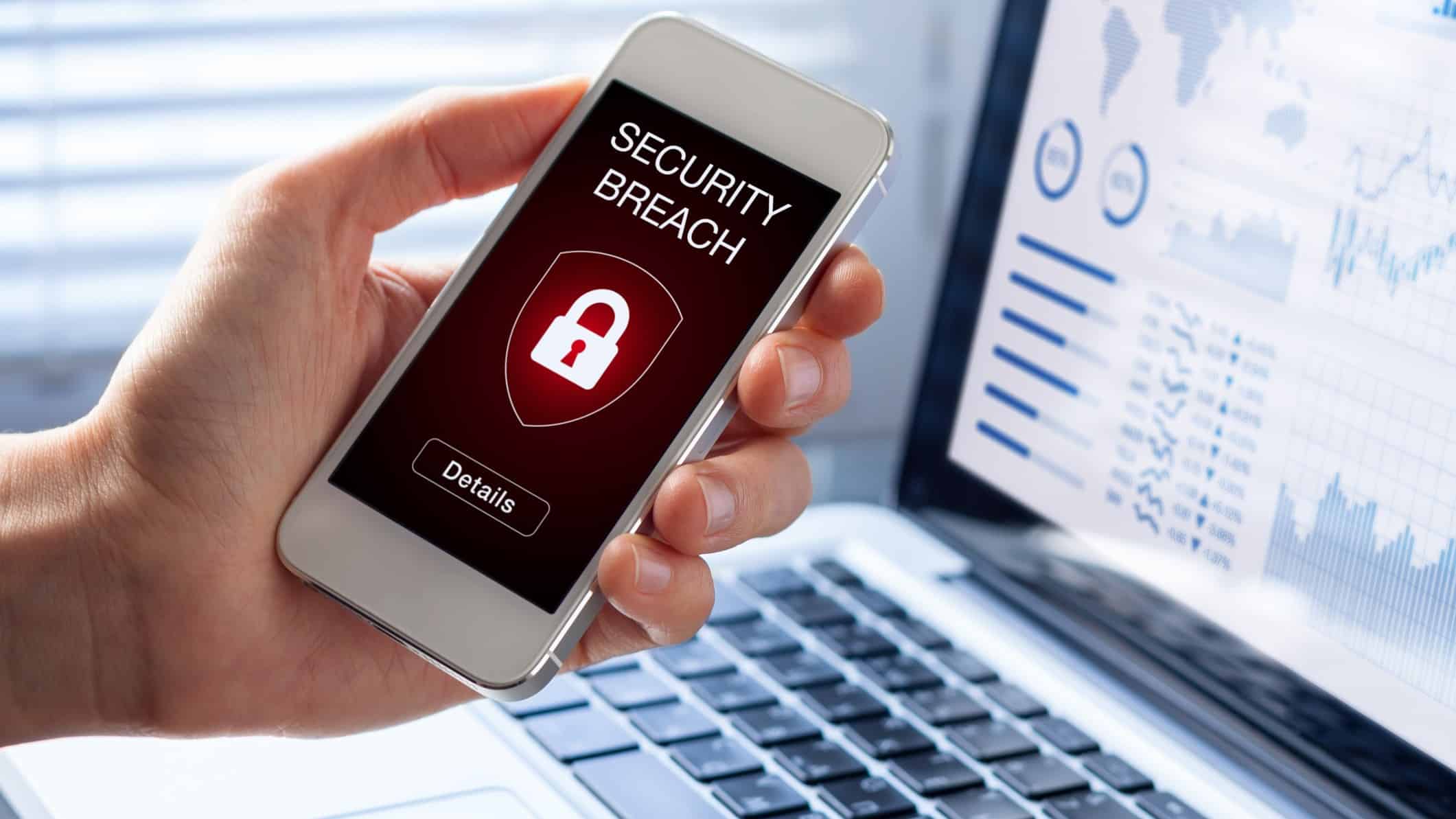 falling telco asx share price represented by mobile phone displaying security breach