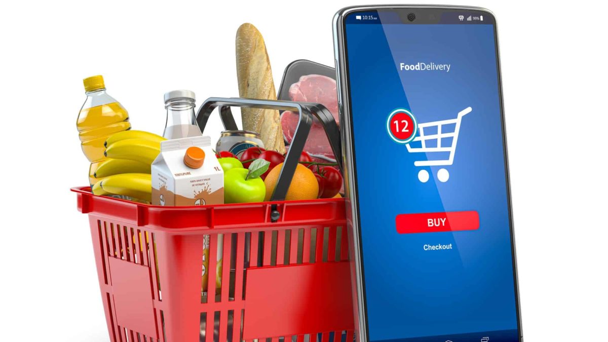basket of grocery items with smart phone ordering system
