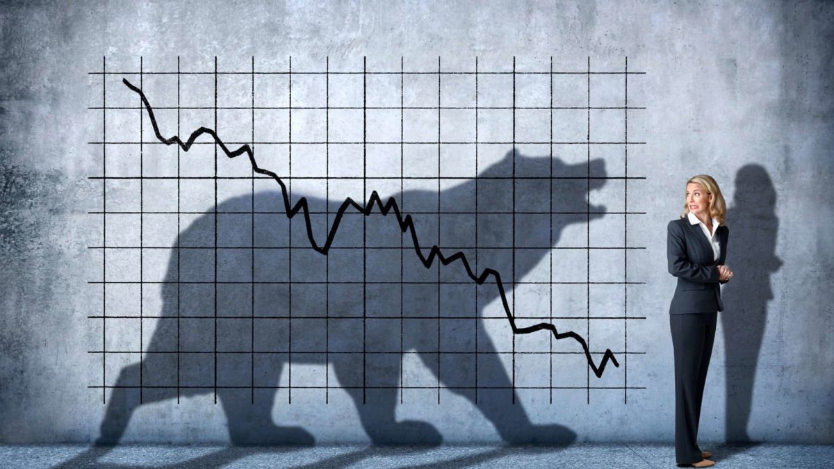 shadow bear with woman terrified and a falling share price
