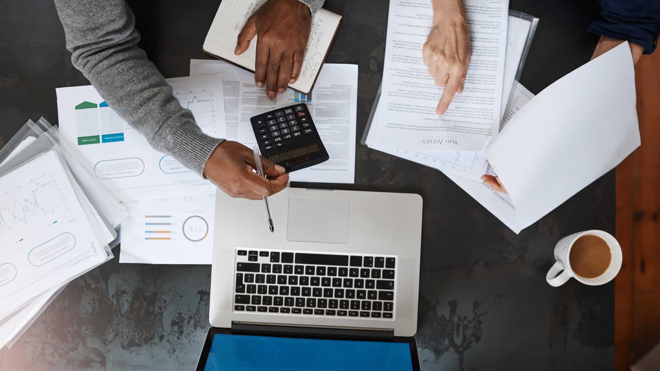 man and woman calculating financial assests