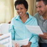 a couple getting financial advice from a consultant
