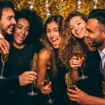 young people celebrating at a gold party