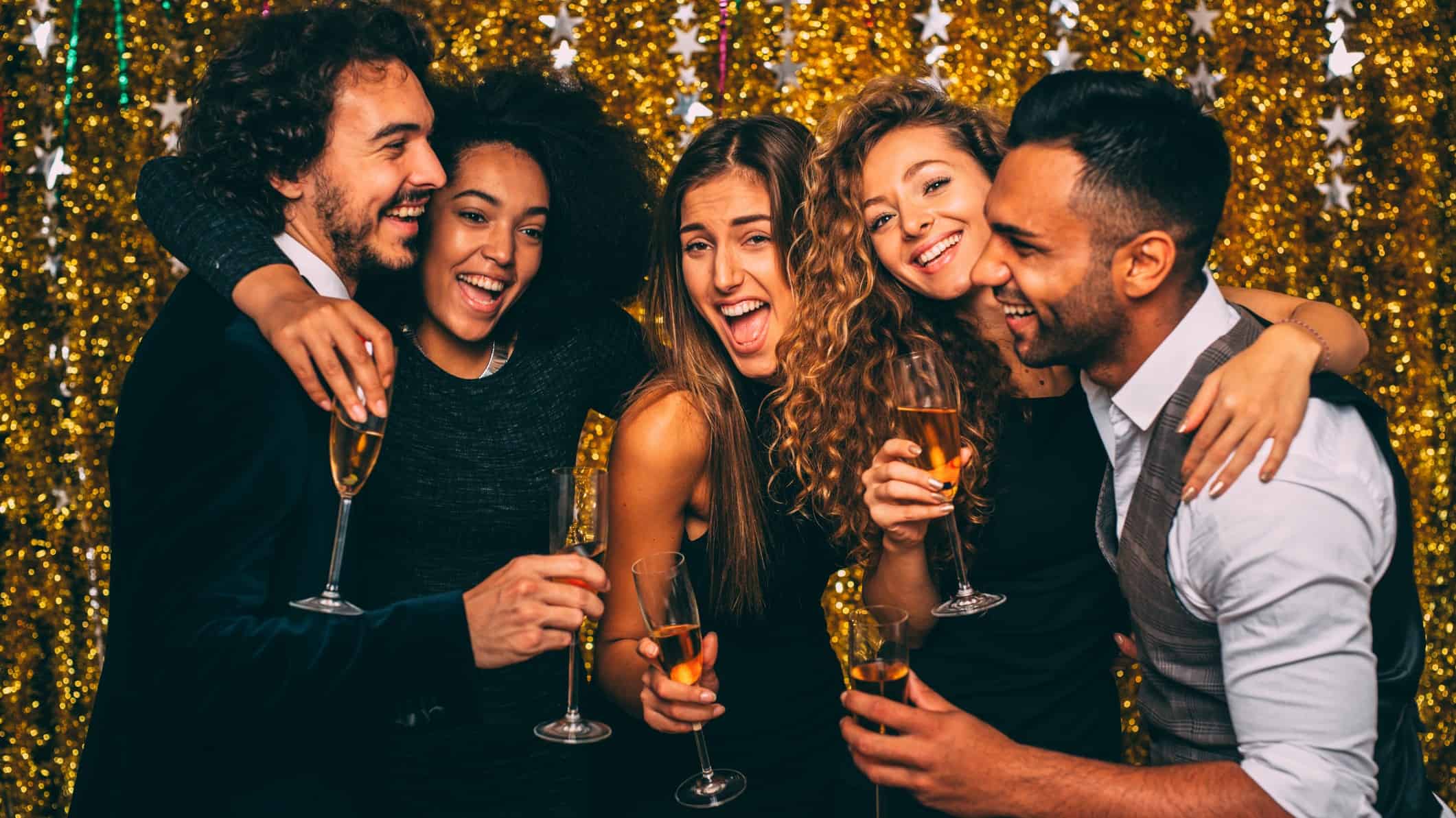 young people celebrating at a gold party