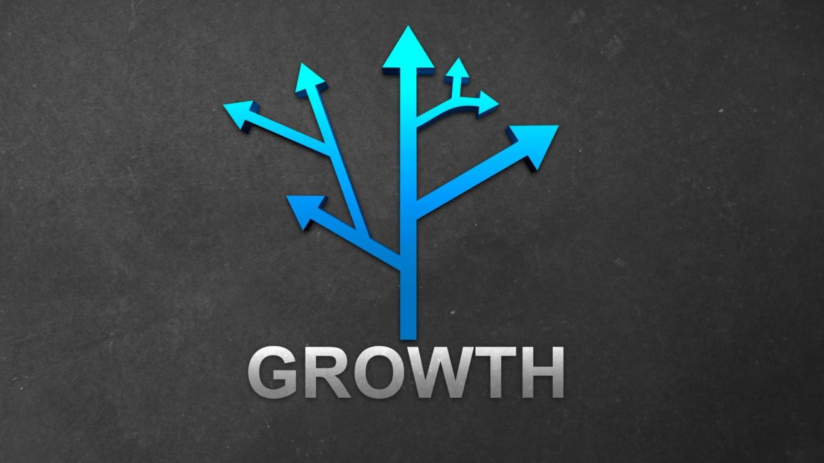 The word growth with bles arrows shooting up above it, indicating a share price movement for ASX growth stocks