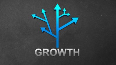 The word growth with bles arrows shooting up above it, indicating a share price movement for ASX growth stocks