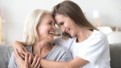 mum and daughter happily embracing each other