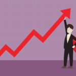 red arrow representing a rise of the share price with a man wearing a cape holding it at the top