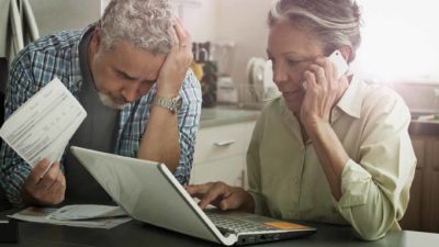 A couple stressed about their financial situation considering going bankrupt.