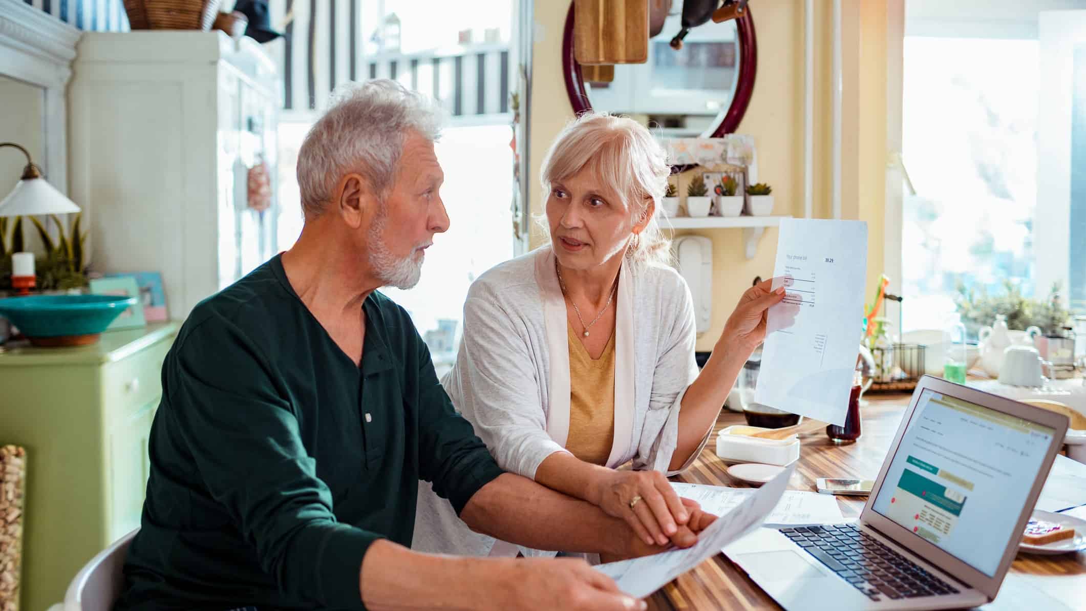man and woman discussing superannuation