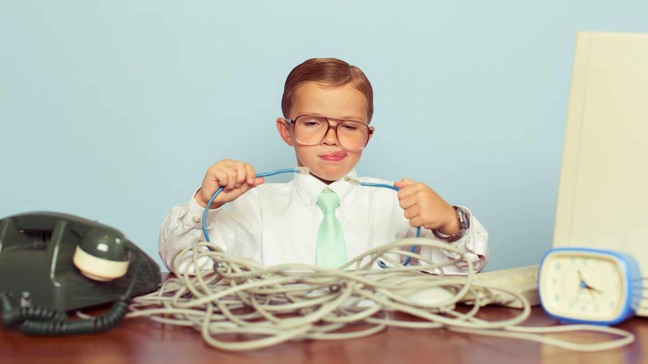 Retro style images of a child fixing an old-fashioned computer, indicating a new ASX company with unknown share price value