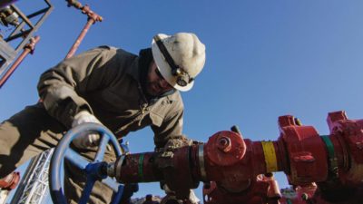 gas and oil worker on pipeline equipment