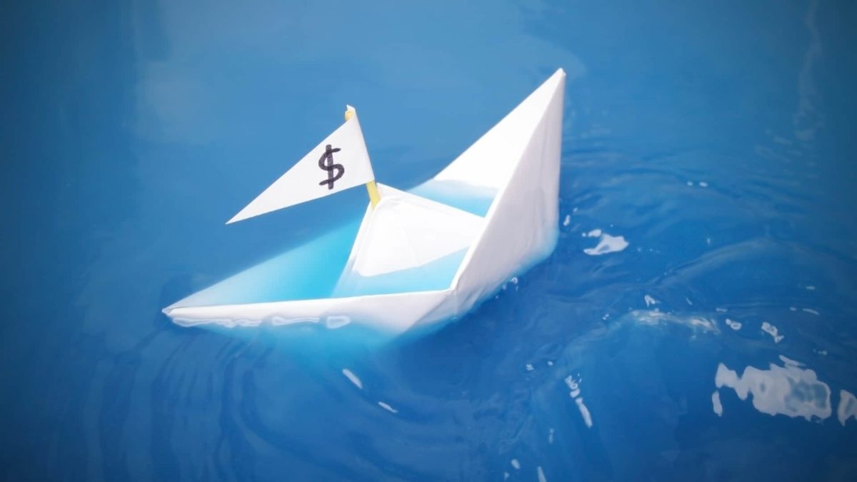Australian dollar ASX 200 shares sinking paper boat with dollar sign flag taking in water