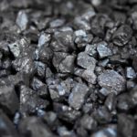 Mineral broken up coal