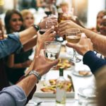 Group of people toasting with wine