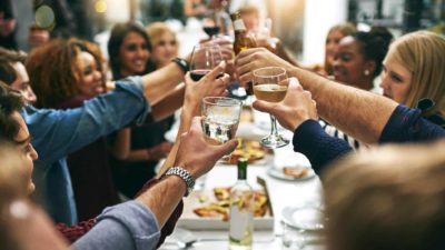 Group of people toasting with wine