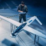 Military engineer works on drone