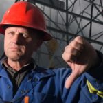 Miner with thumbs down.