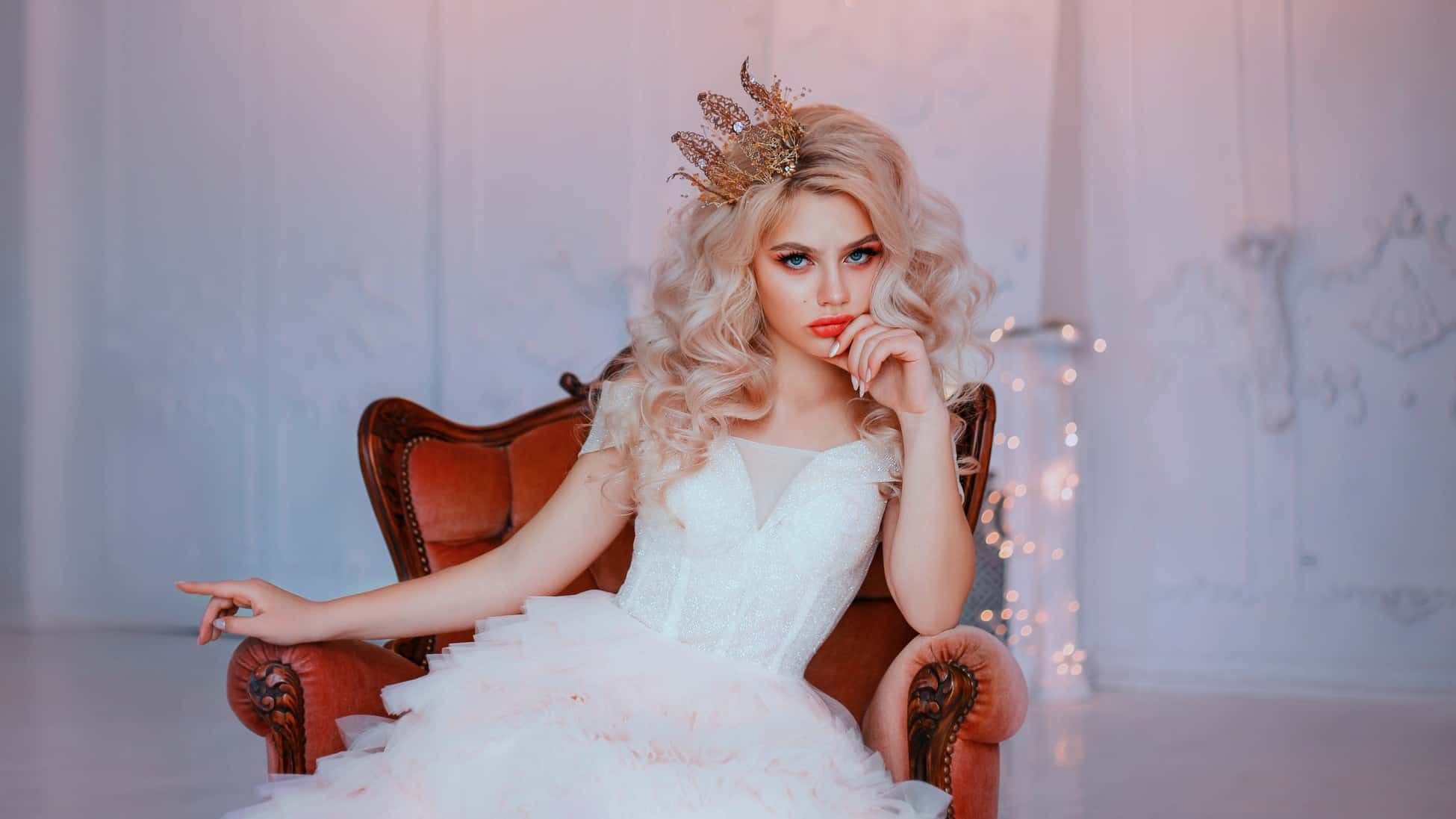 Woman in dress sitting in chair looking depressed