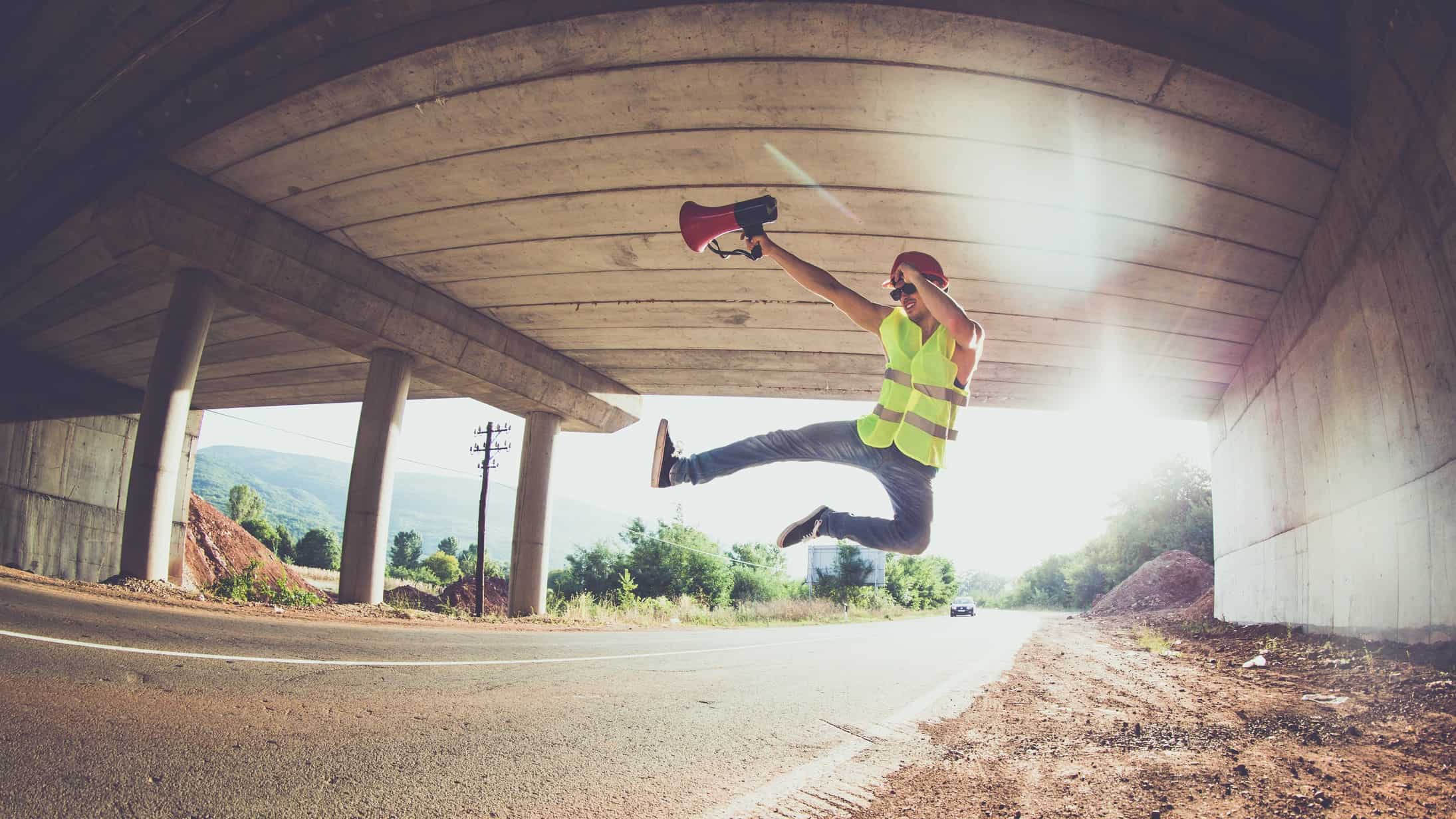 construction worker celebrates success in a tunnel