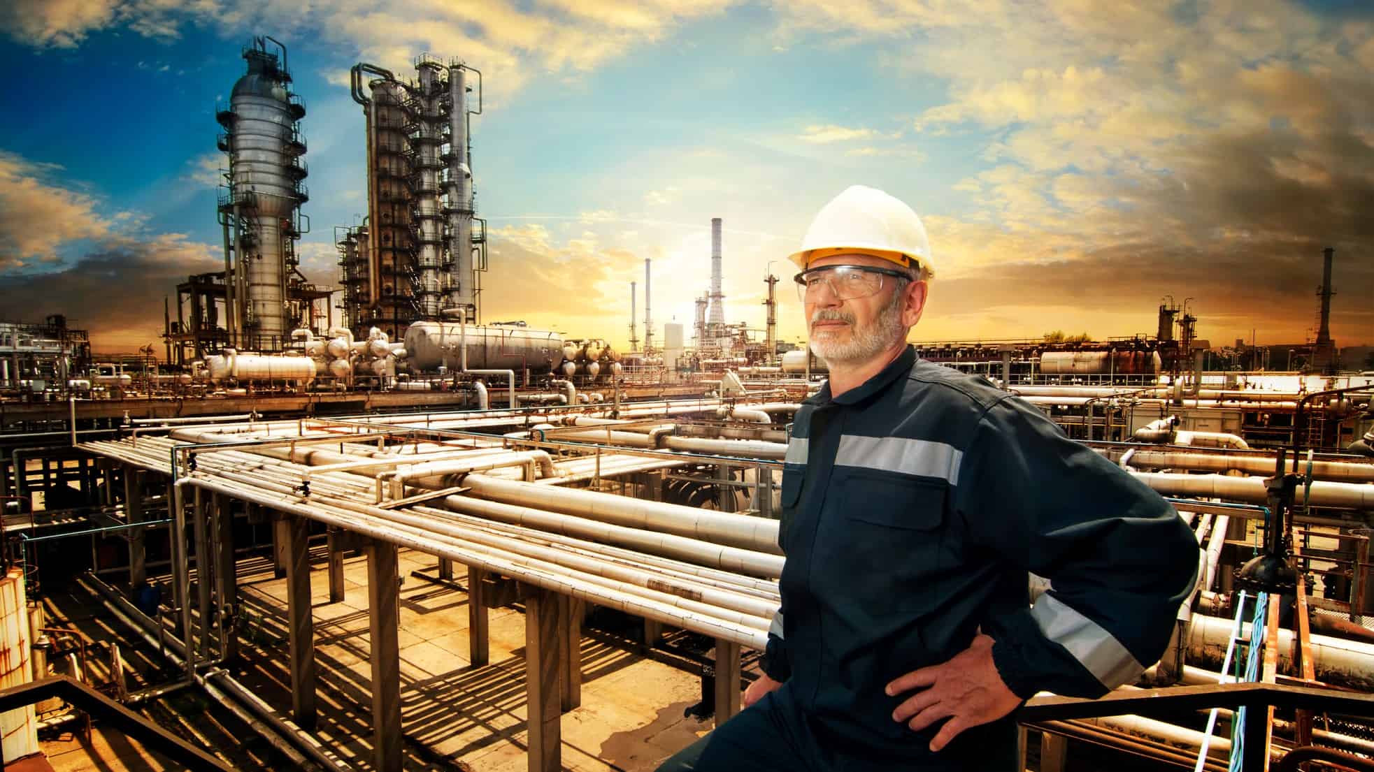 worker in hard hat at an oil refinery