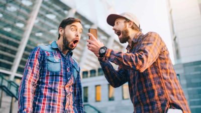 Two men excited to win online bet