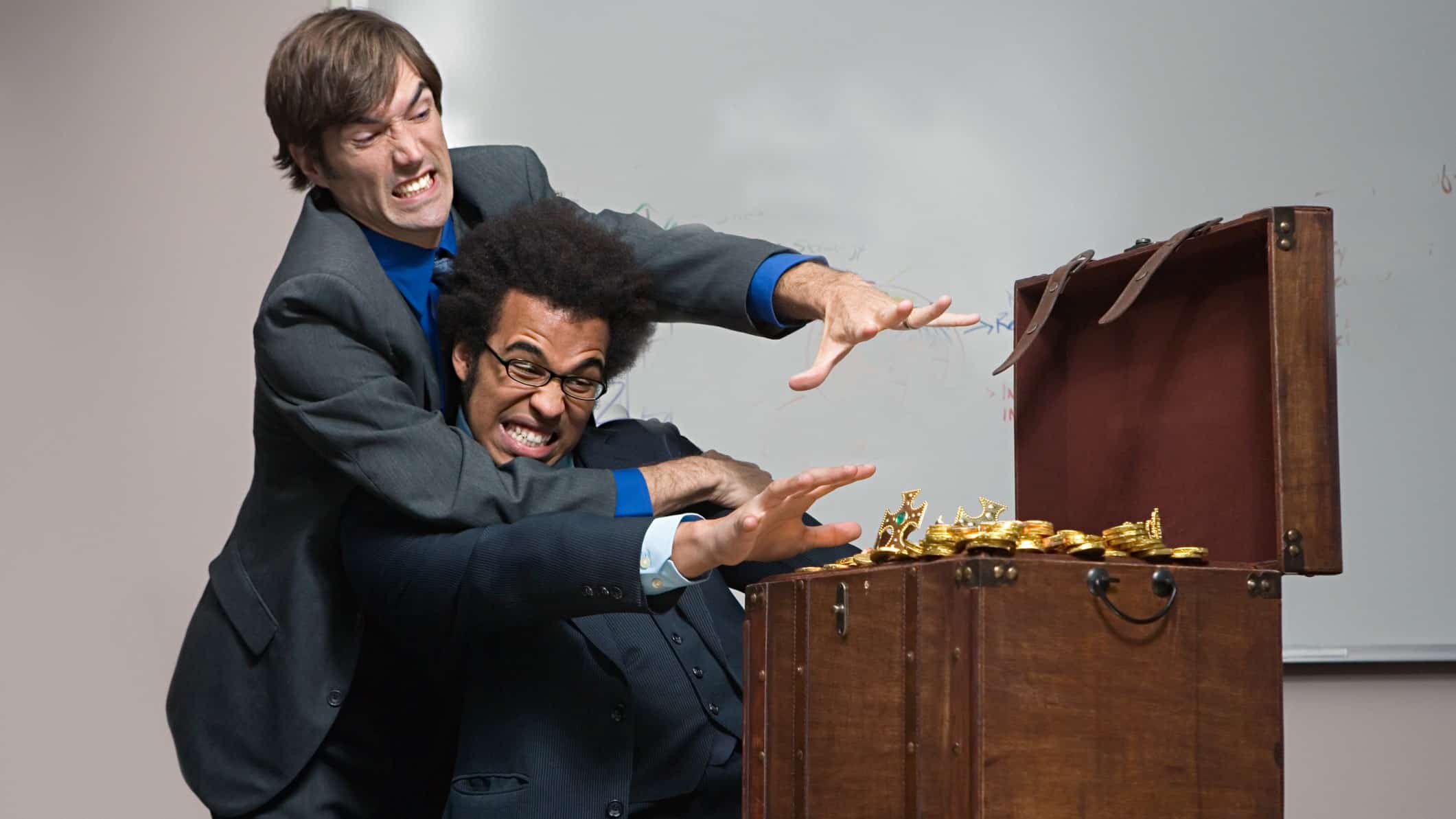 Two ASX shares investors fighting each other to grab gold treasure.