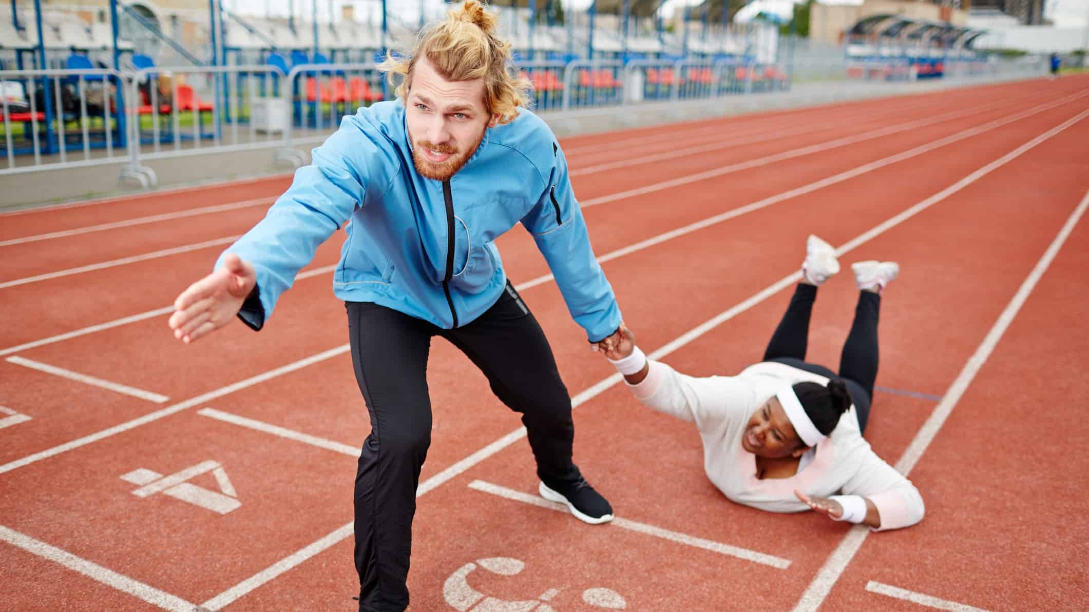 ANZ Bank share price 2021 man attempting to pull tired woman over finish line in running race