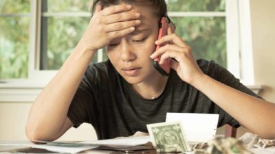 stressed woman worrying about bills