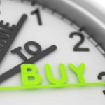 A white and black clock face is shown with three hands saying Time to Buy reflecting Citi's view that it's time to buy ASX 200 banks