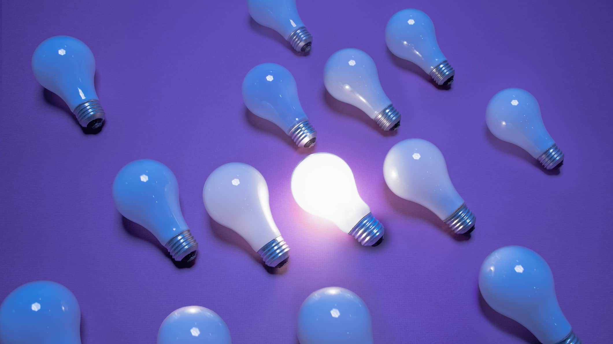 Energy light bulbs with one lit up