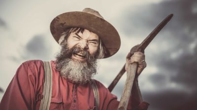 Excited Miner with pick ax