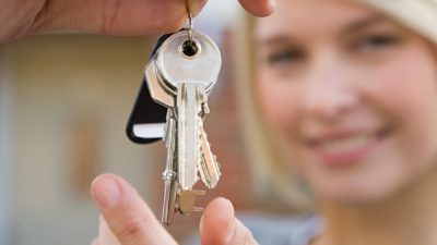 keys to the castle as a woman gets the keys to her new house