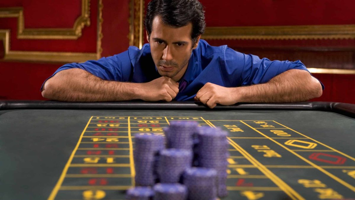A gambler at a casino bets a pile of chips on one number