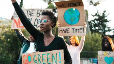 People holding banners protesting against climate change