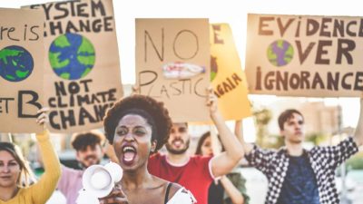 Group of people with banners in climate change protest